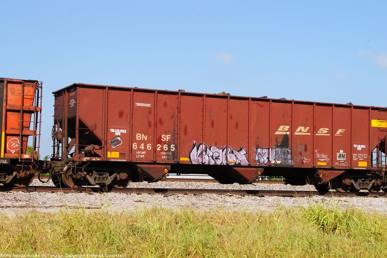 BNSF 646265 - captured MOW Tie Service